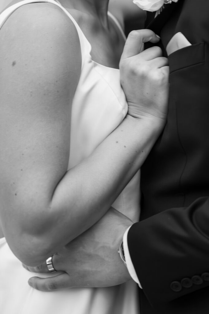 close up photo of bride and groom's hands in Detroit Michigan