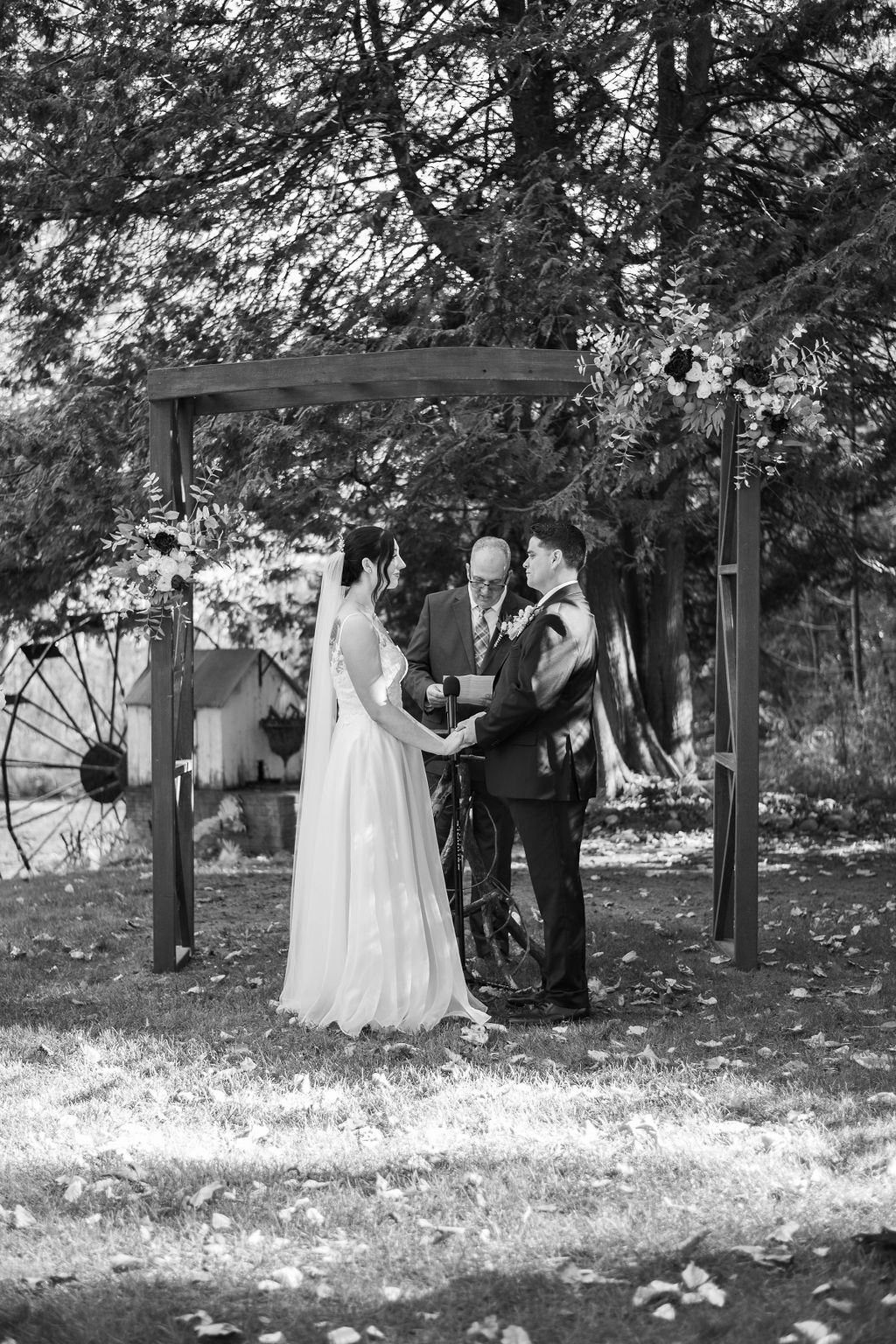 bride and groom during wedding ceremony at Crooked Rivers Weddings, a northern Michigan wedding venue