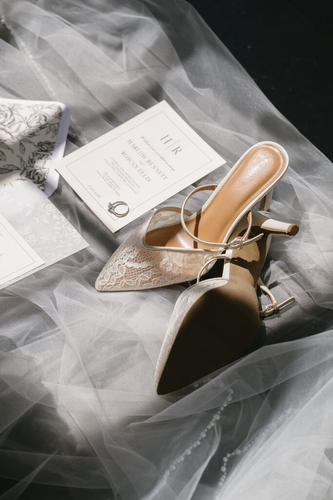 wedding shoes sitting on veil
