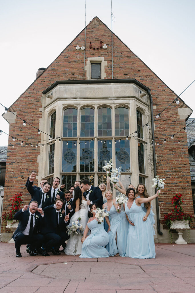 wedding party in front of pine knob golf course venue