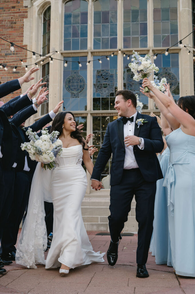 couple walking in front of golf club wedding venue