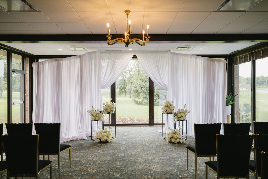 indoor wedding ceremony space at golf course