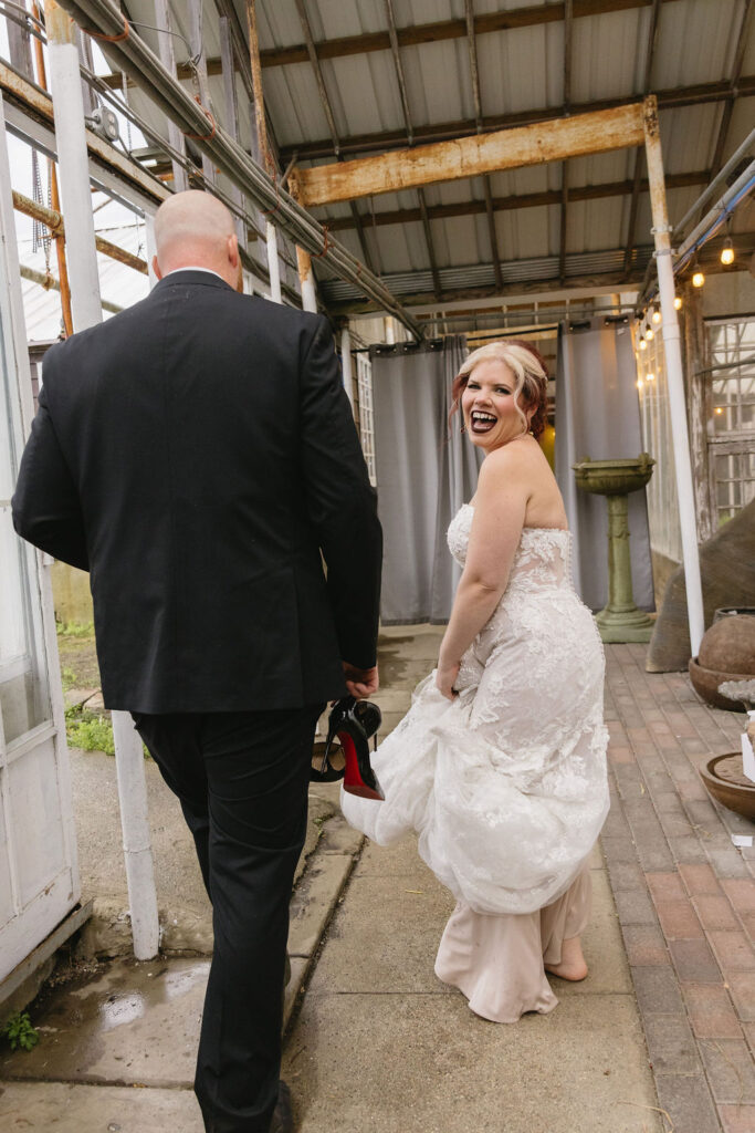 bride and groom walking outside