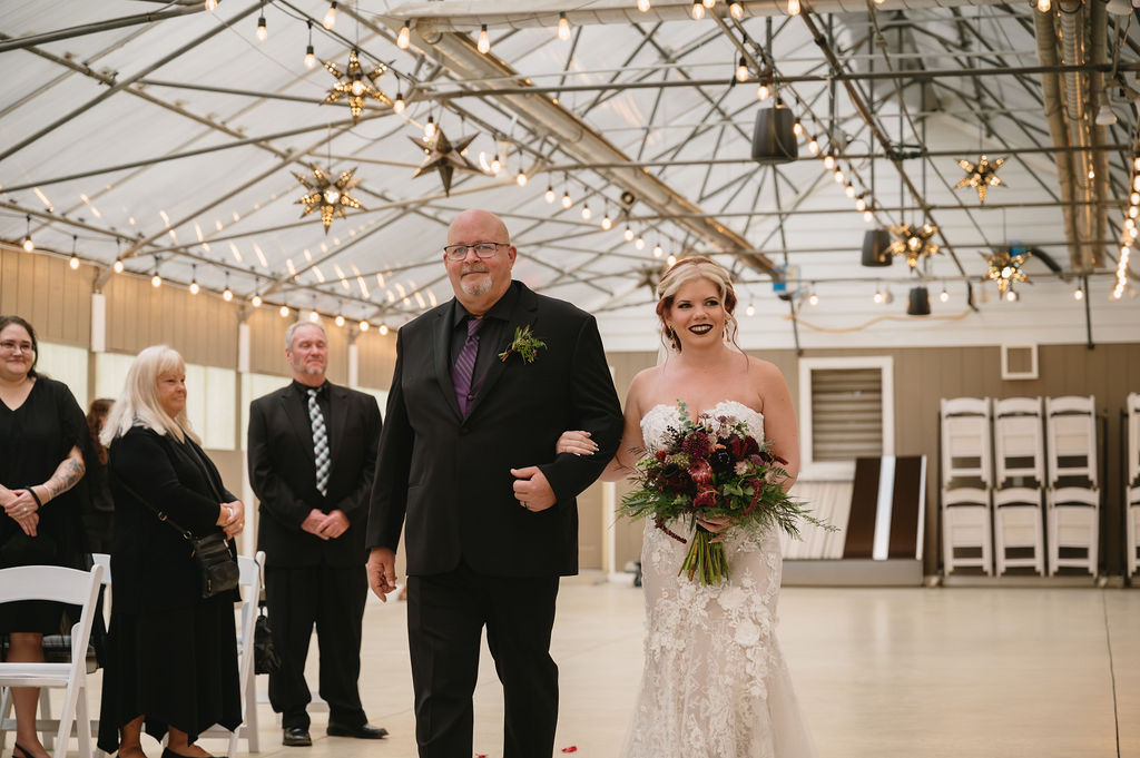 bride and father walking down aisle