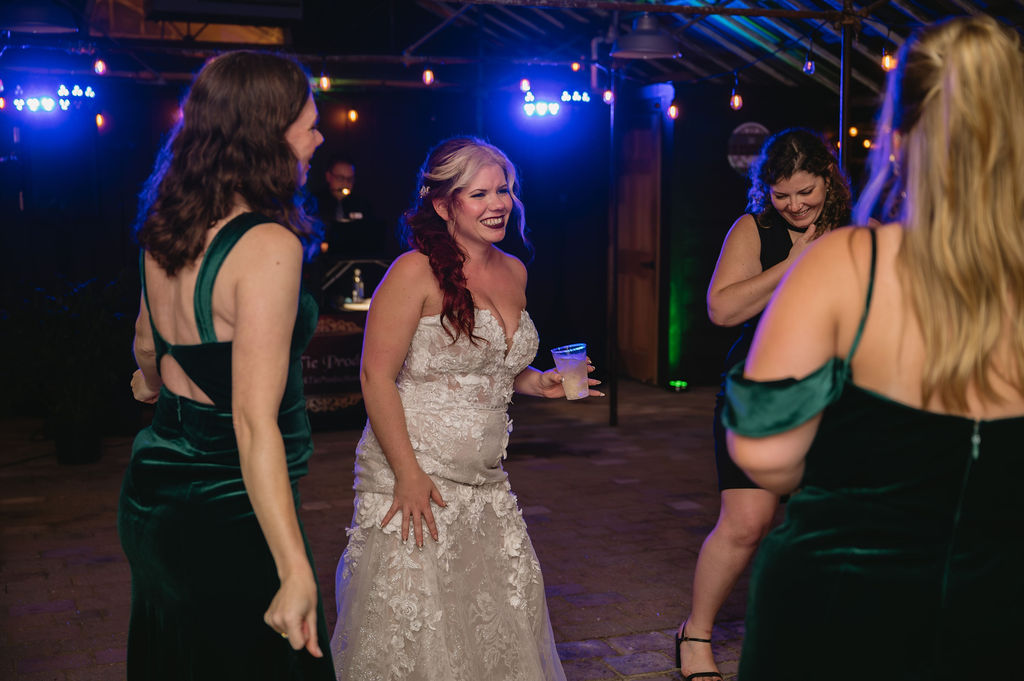 guests dancing at wedding reception 