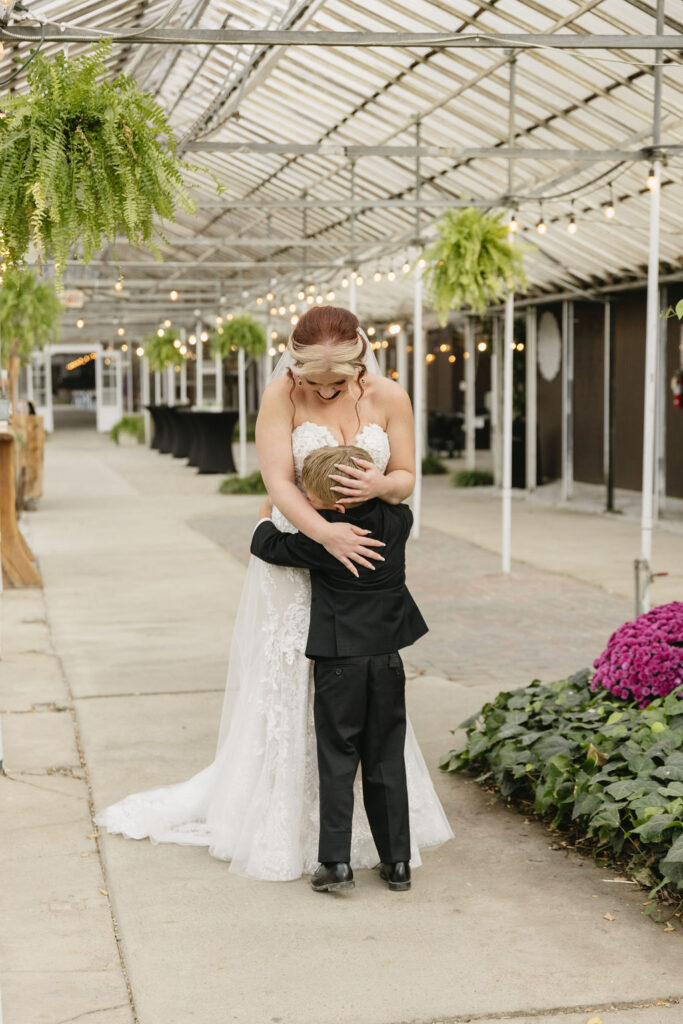 bride and son first look in Goldner Walsh