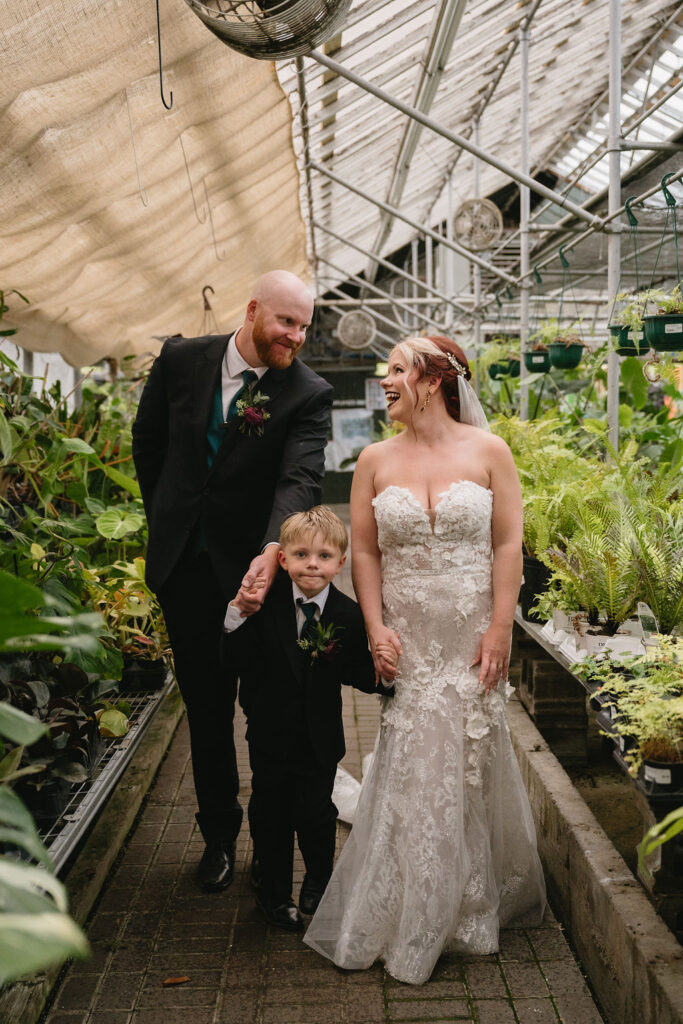 wedding portrait of family in Goldner Walsh greenhouse