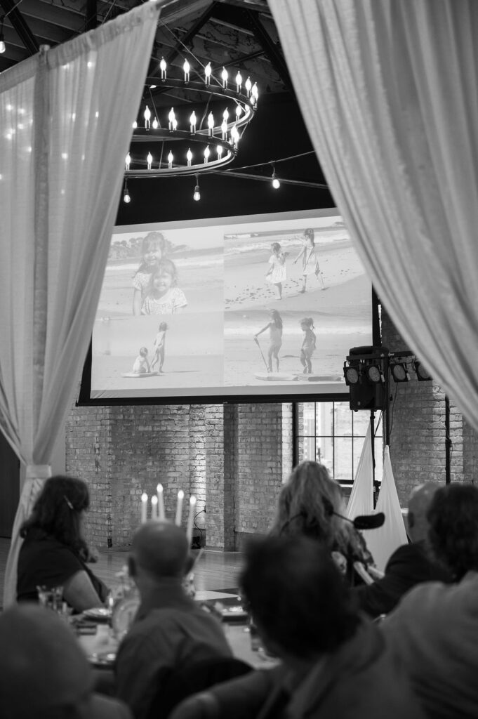 projector screen at wedding reception