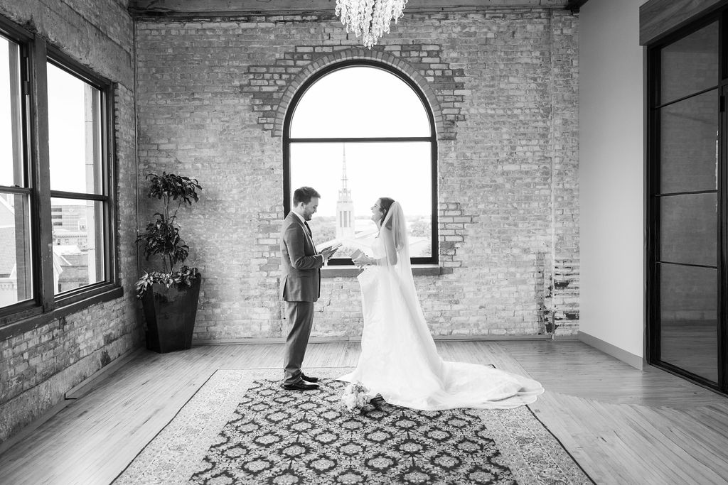 couple reading vows inside the high five grand rapids