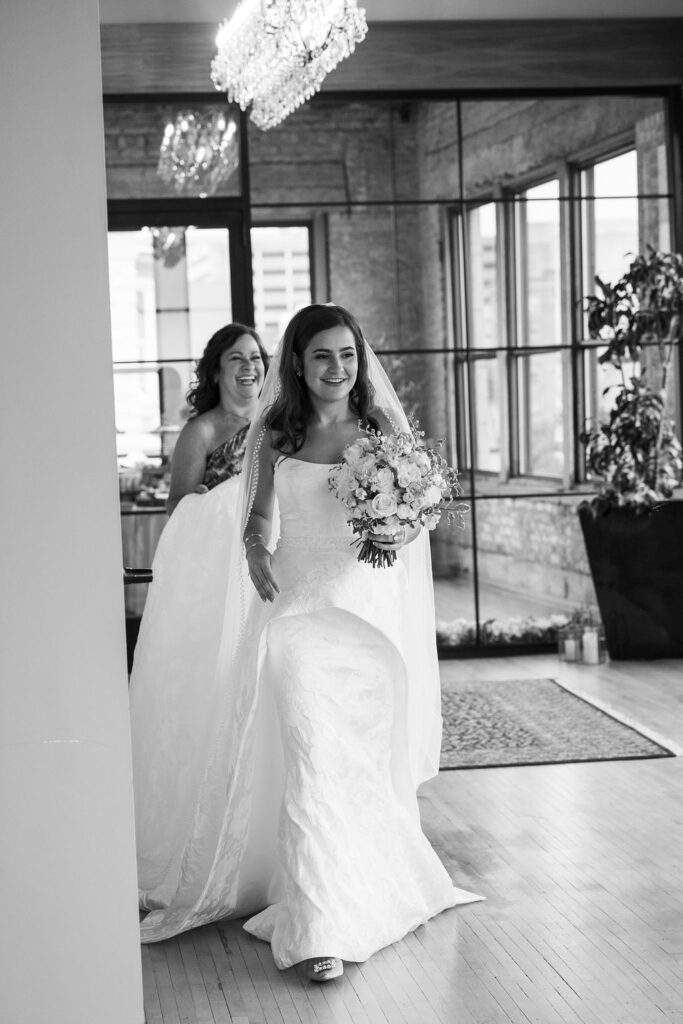 bride walking into the high five gr wedding venue