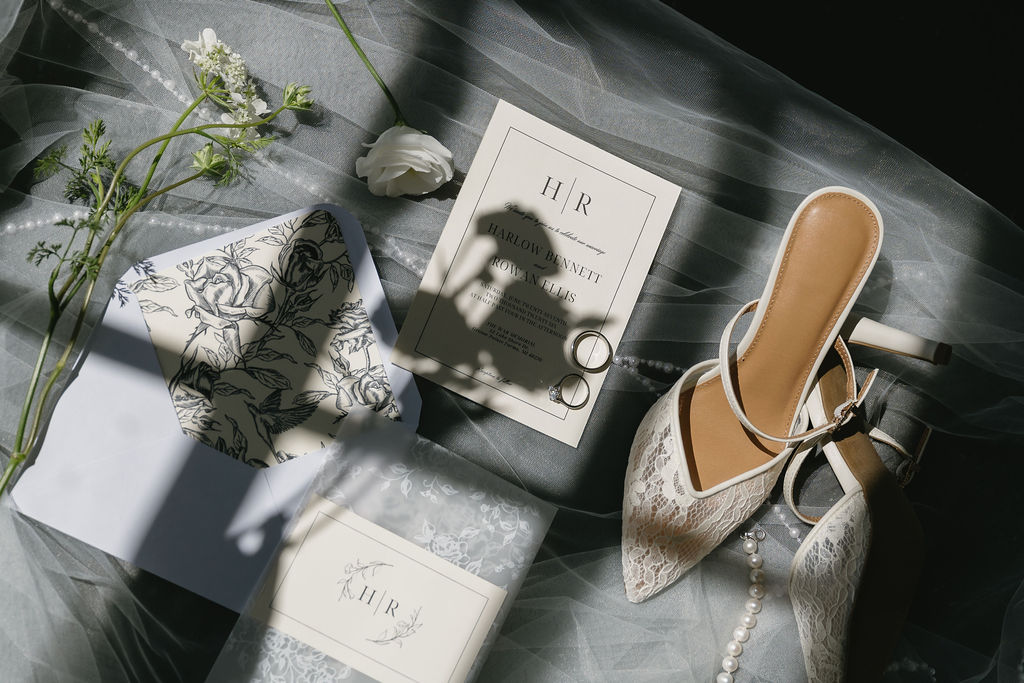 white invitation suite for wedding with shadow florals