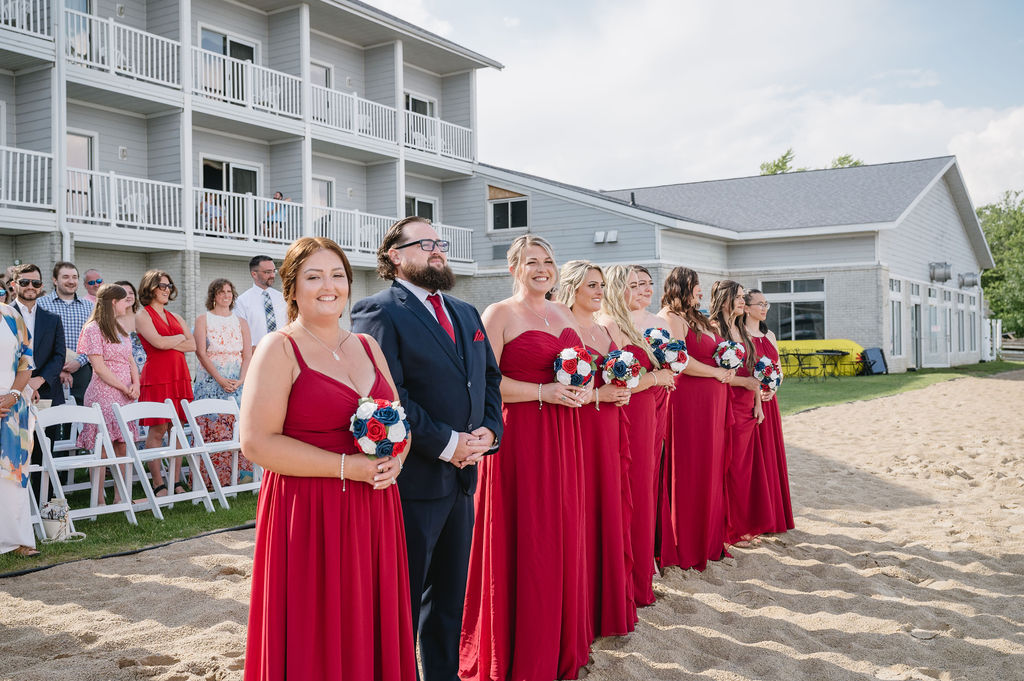 bridesmaids at lakeside wedding ceremony