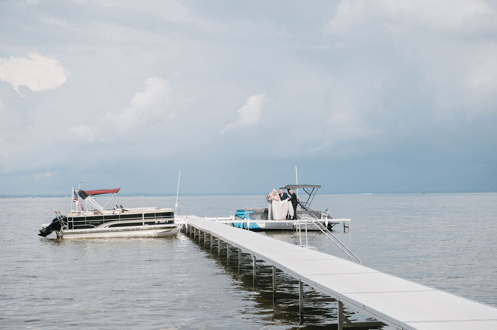 bride entering wedding ceremony on a boat