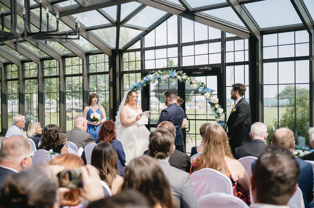 wedding ceremony at lakefront wedding venue
