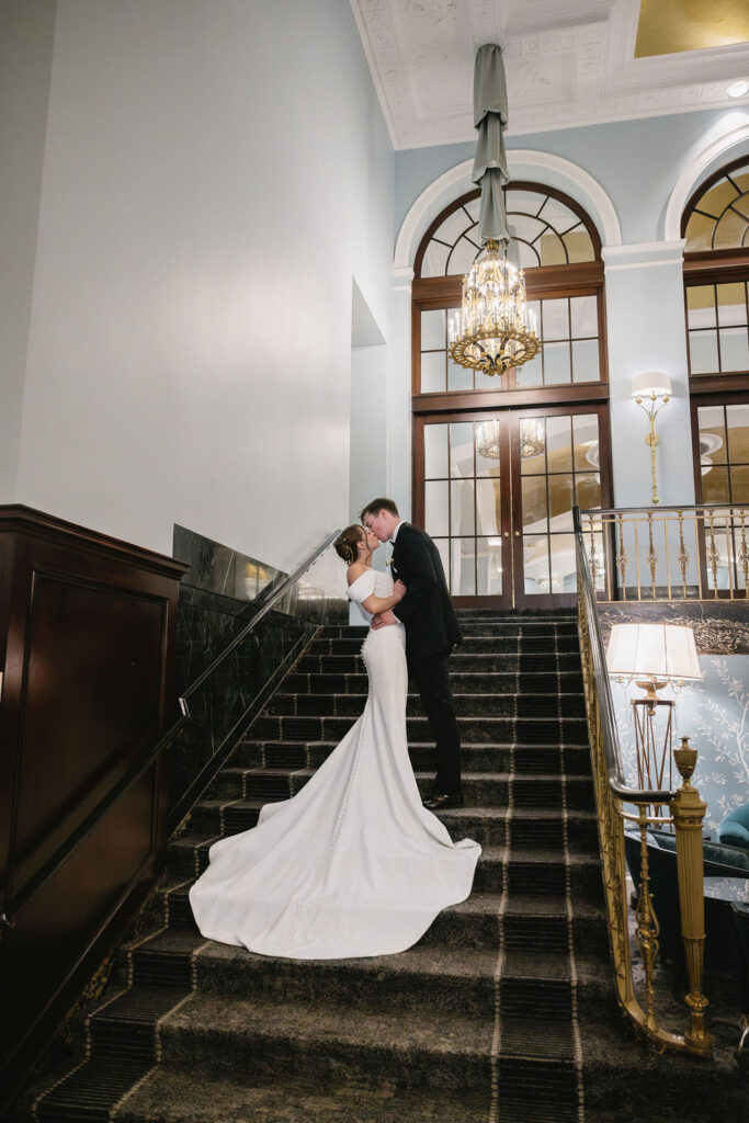 bride and groom outside imperial ballroom at amway grand