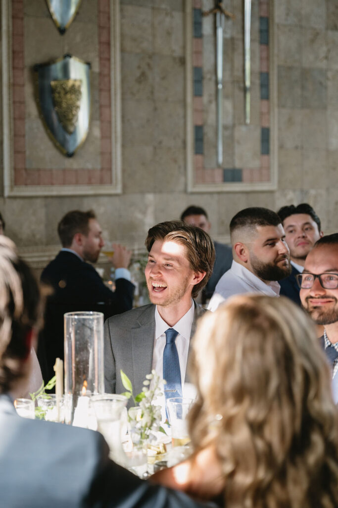 wedding guest laughing