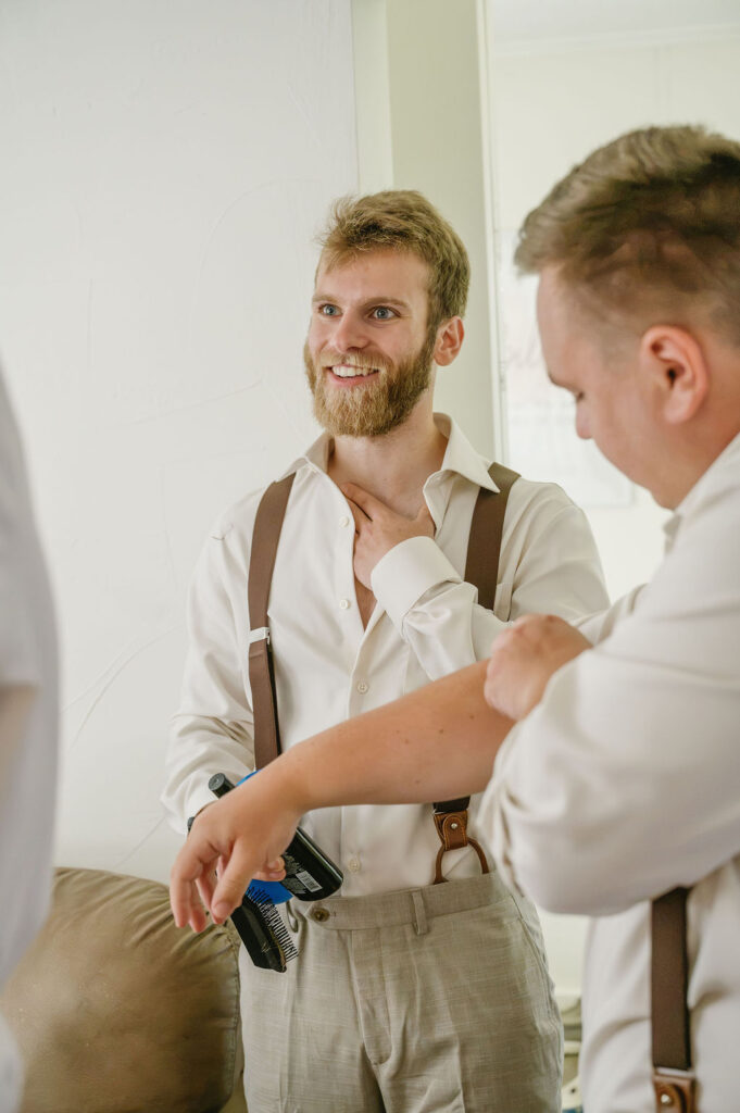 groomsmen getting dressed