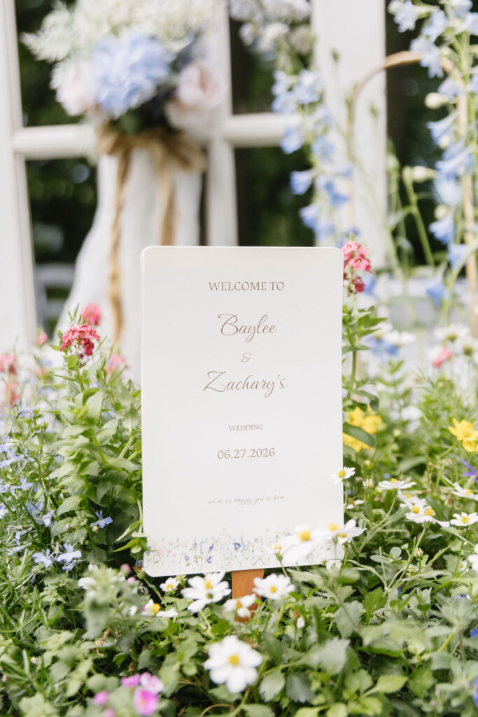 wedding program sitting in florals