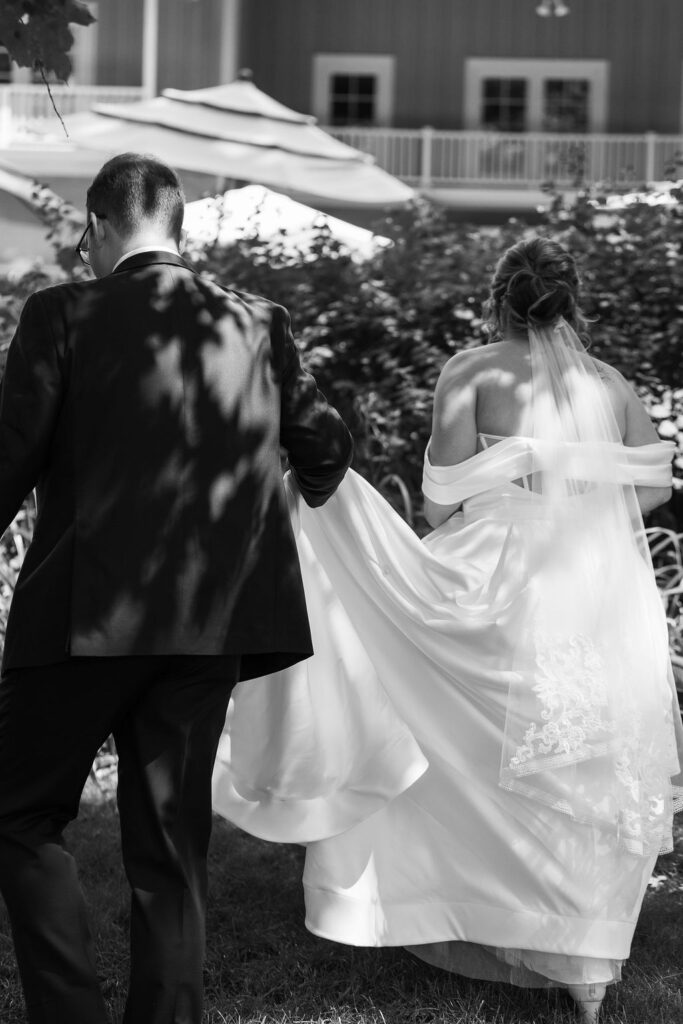 bride and groom walking away
