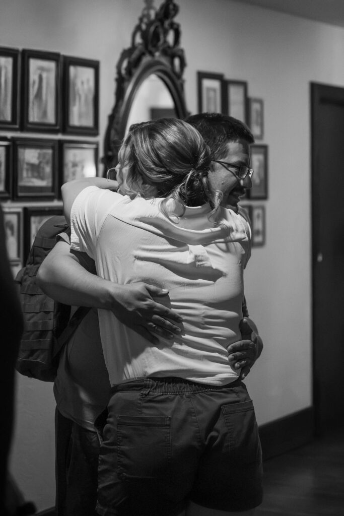 bride hugging brother