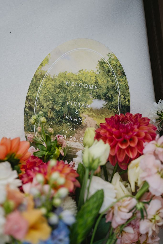 wedding program next to bridal bouquet